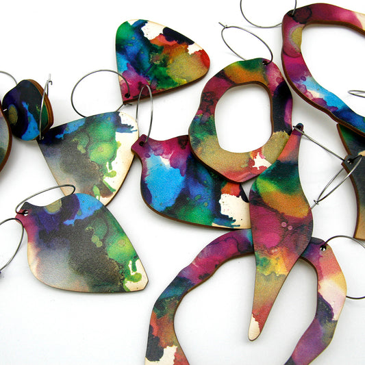 Shop women's art wooden earring collection. Made from sustainable wood with stainless steel hoops. Made in Australia.