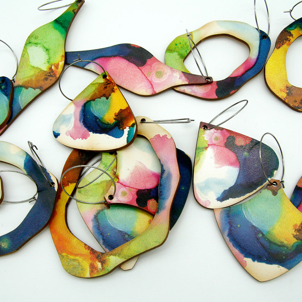 Shop women's art wooden earring collection. Made from sustainable wood with stainless steel hoops. Made in Australia.