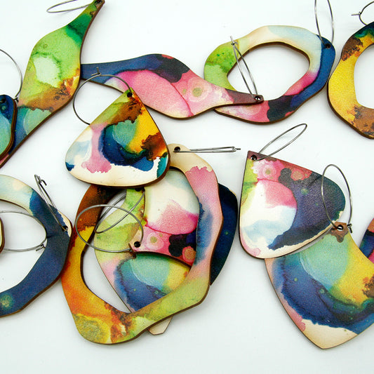 Shop women's art wooden earring collection. Made from sustainable wood with stainless steel hoops. Made in Australia.