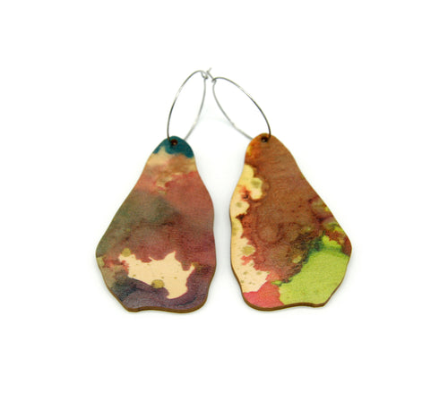 Shop women's wooden earrings named ‘Rock Land’ shaped as a natural rock. Made from sustainable wood with stainless steel hoops. Made in Australia.