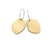 Back of wooden earrings named ‘Rock Drop Light’ shaped as a natural rock. Made from sustainable wood with stainless steel hoops. Made in Australia.