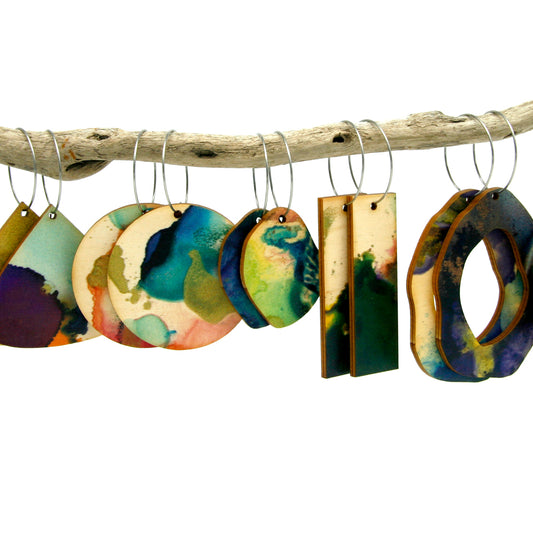 Shop women's art wooden earring collection. Made from sustainable wood with stainless steel hoops and backs. Made in Australia.