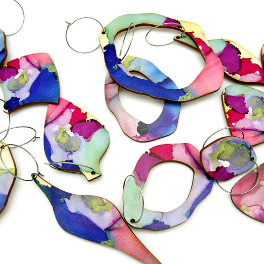 Shop women's art wooden earring collection. Made from sustainable wood with stainless steel hoops. Made in Australia.