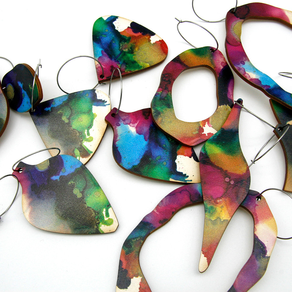 Shop women's art wooden earring collection. Made from sustainable wood with stainless steel hoops. Made in Australia.