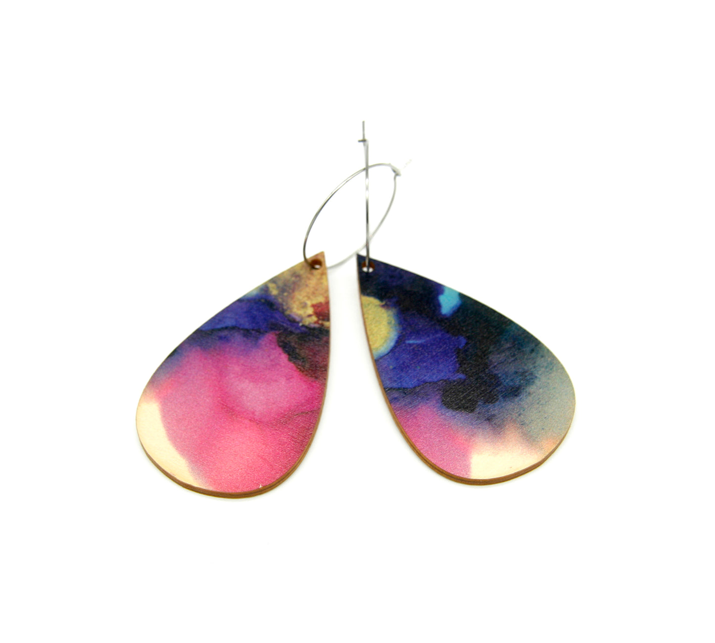 Shop women's wooden earrings shaped as a rain drop. Made from sustainable wood with stainless steel hoops. Made in Australia.