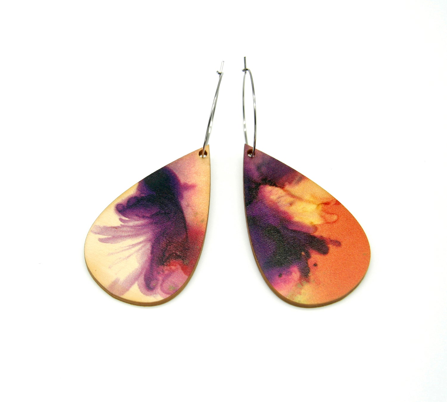 Shop women's wooden earrings 'drop dine' shaped as a rain drop. Made from sustainable wood with stainless steel hoops. Made in Australia.
