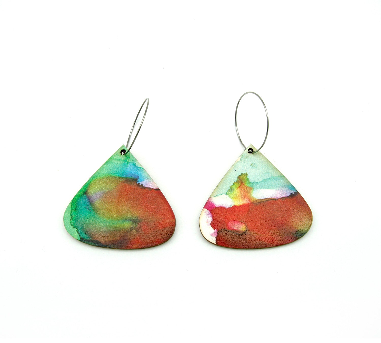 Shop women's wooden earrings named ’Droplet Delight’ shaped as a natural shield. Made from sustainable wood with stainless steel hoops. Made in Australia.