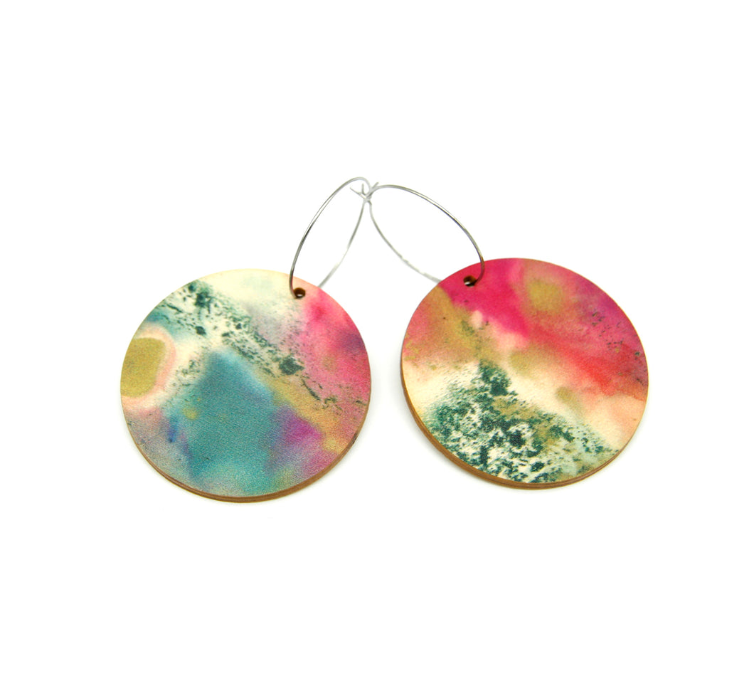 Shop women's wooden earrings named ‘Round 45 Spring’ with a round shape. Made from sustainable wood with stainless steel hoops. Made in Australia.