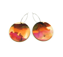 Shop women's wooden earrings named ‘Round 45 Fire’ with a round shape. Made from sustainable wood with stainless steel hoops. Made in Australia.