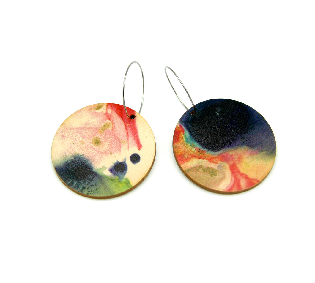 Shop women's wooden earrings named ‘Round 45 Heights’ with a round shape. Made from sustainable wood with stainless steel hoops. Made in Australia.