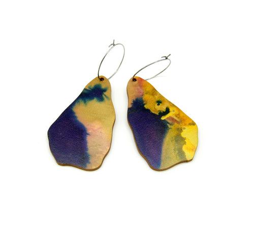 Shop women's wooden earrings named ‘Rock Delve’ shaped as a natural rock. Made from sustainable wood with stainless steel hoops. Made in Australia.