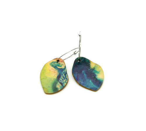 Shop women's wooden earrings named ‘Rock Drop Ground’ shaped as a natural rock. Made from sustainable wood with stainless steel hoops. Made in Australia.