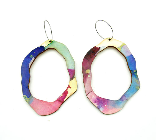 Shop women's wooden earrings named ‘Rock Hollow Heart Statement’ shaped as a natural rock. Made from sustainable wood with stainless steel hoops. Made in Australia.