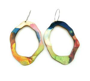 Shop women's wooden earrings named ‘Rock Hollow Wave Statement’ shaped as a natural rock. Made from sustainable wood with stainless steel hoops. Made in Australia.