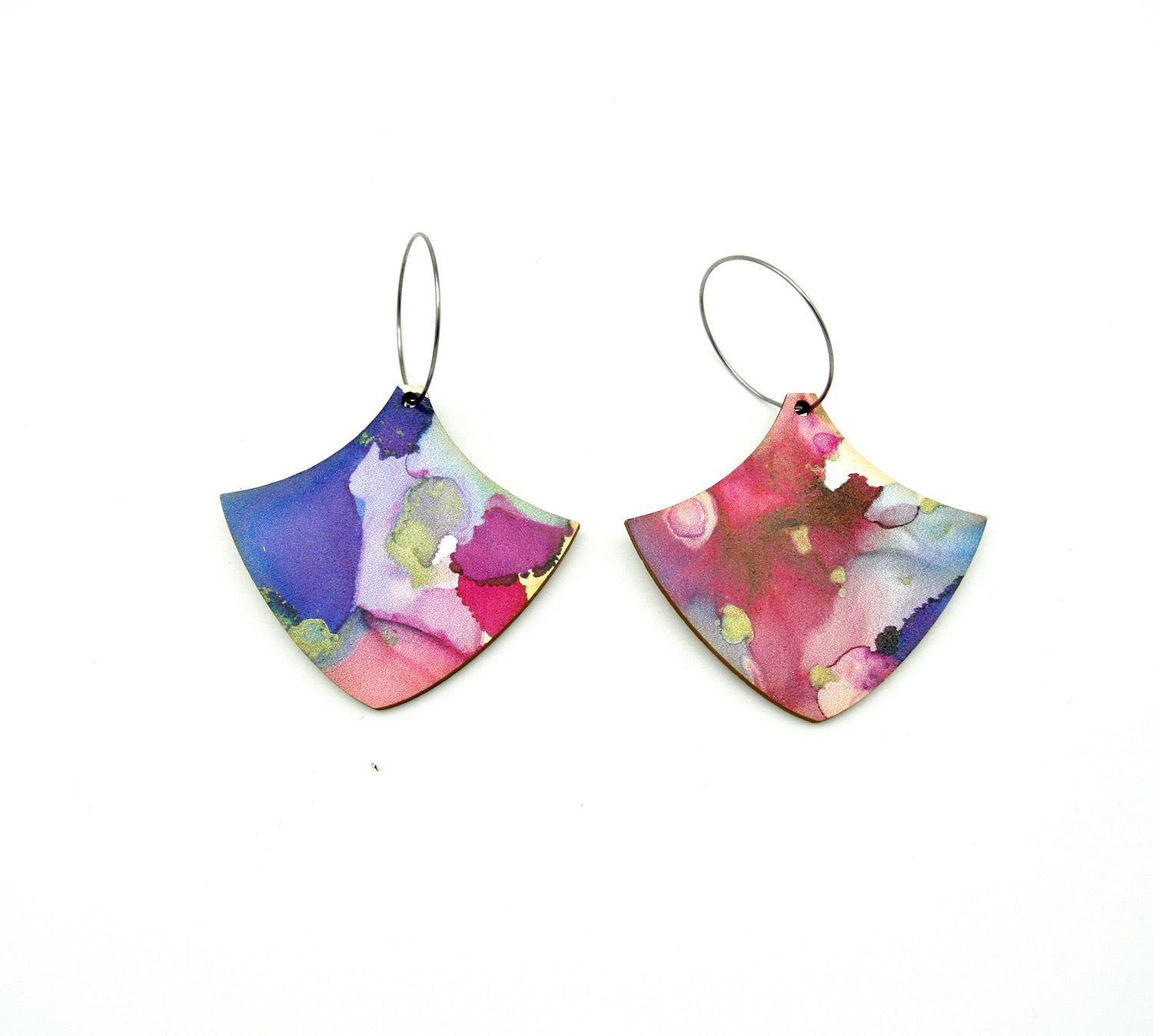 Shop women's wooden earrings named ‘heart shield’ shaped as a natural shield. Made from sustainable wood with stainless steel hoops. Made in Australia.