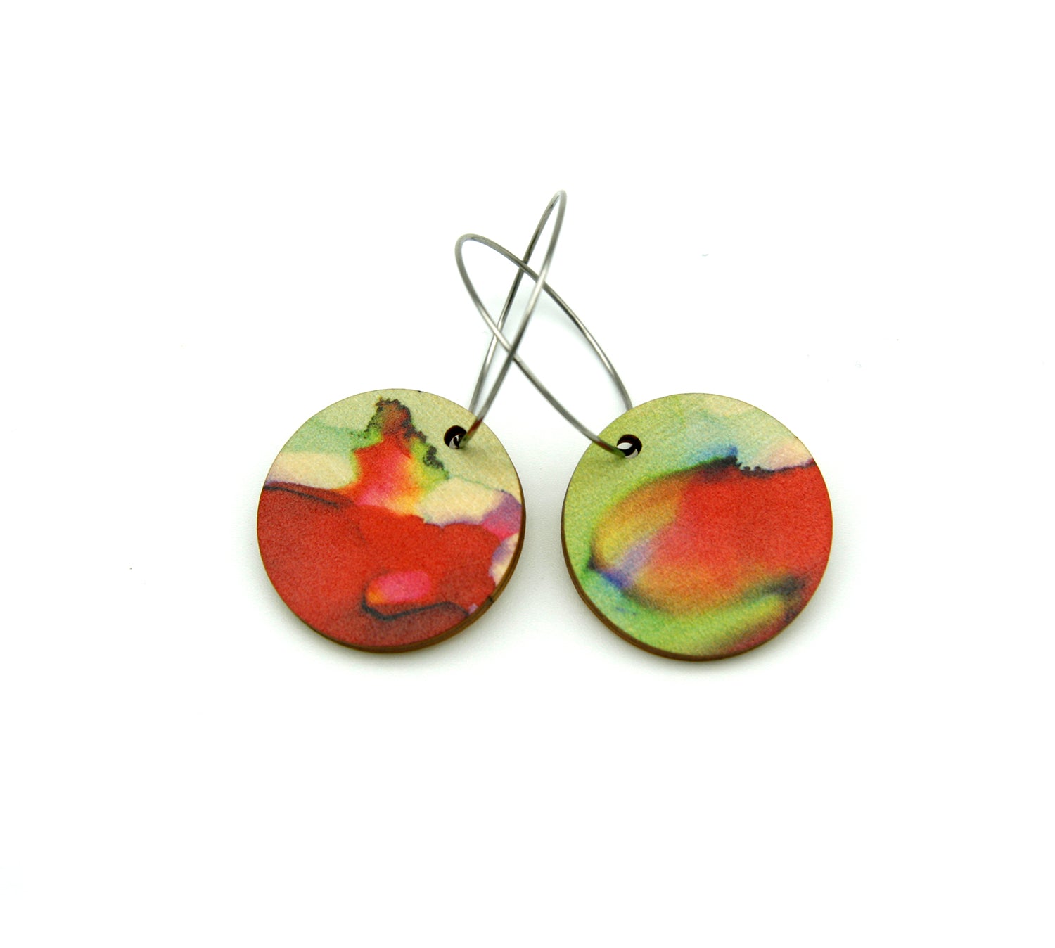 Shop women's wooden earrings named ‘Round 25 Delight’ with a round shape. Made from sustainable wood with stainless steel hoops. Made in Australia.