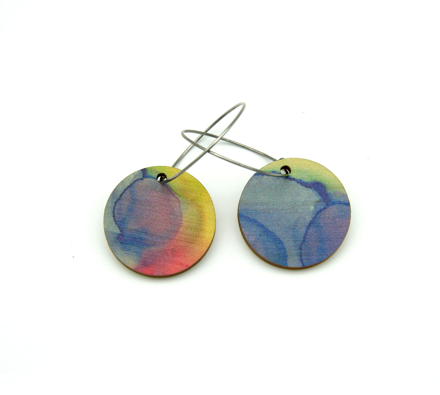 Shop women's wooden earrings named ‘Round 25 Sky’ with a round shape. Made from sustainable wood with stainless steel hoops. Made in Australia.