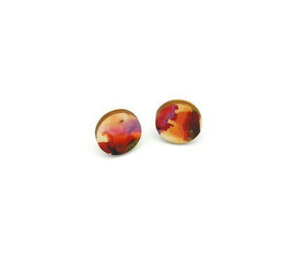 Shop women's wooden earrings named ‘Stud Fire’ with a round shape. Made from sustainable wood with stainless steel backs. Made in Australia.