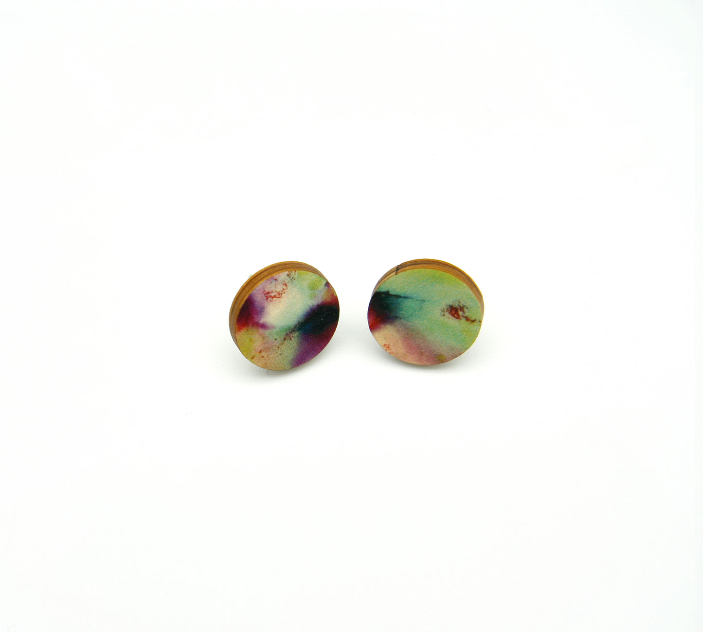 Shop women's wooden earrings named ‘Stud Flight’ with a round shape. Made from sustainable wood with stainless steel backs. Made in Australia.