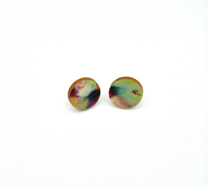 Shop women's wooden earrings named ‘Stud Flight’ with a round shape. Made from sustainable wood with stainless steel backs. Made in Australia.